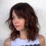 medium-length-brunette-wavy-haircut