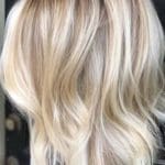 layered-wavy-medium-length-haircuts-for-a-round-fa