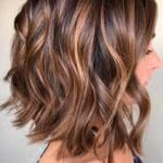 loose-curls-with-highlighted-fringe