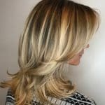 medium-blonde-hairstyle-with-flicked-ends