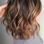 wavy-middle-parted-haircuts-mediumlengthhaircuts