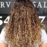 sandy-blonde-balayage-for-naturally-curly-hair