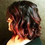 black-wavy-bob-with-red-balayage