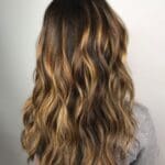 dimensional-honey-balayage-highlights-on-dark-brow