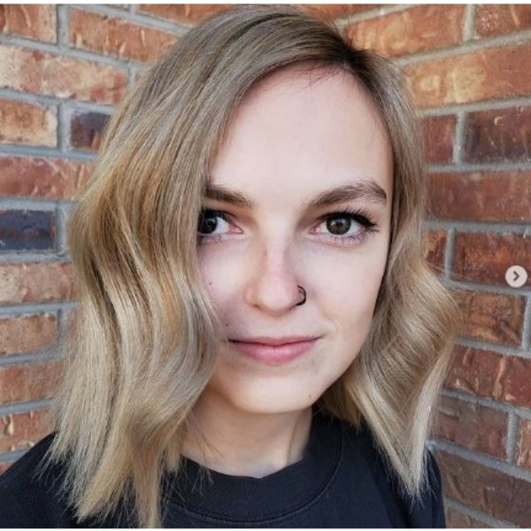Gold Blonde Wavy Chopped Hairstyle