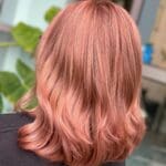 mid-length-blonde-hair-with-rose-gold-hues