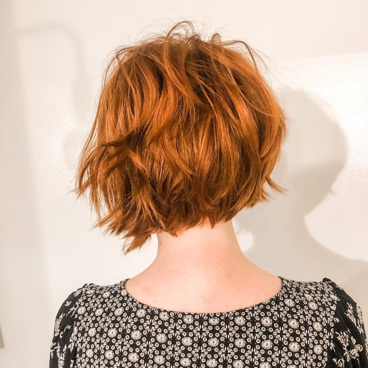 Asymmetrical and messy graduated bob