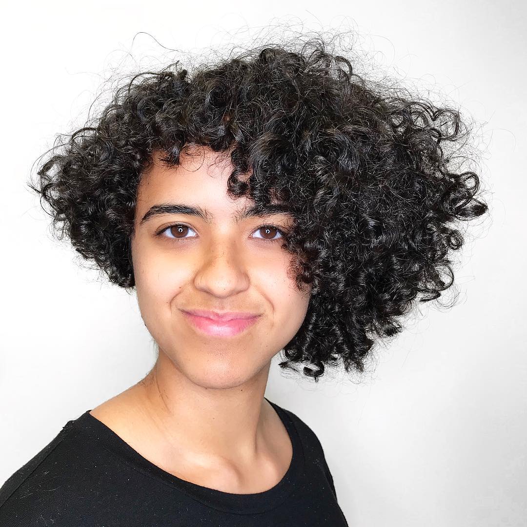 Asymmetrical bob haircut for curly hair