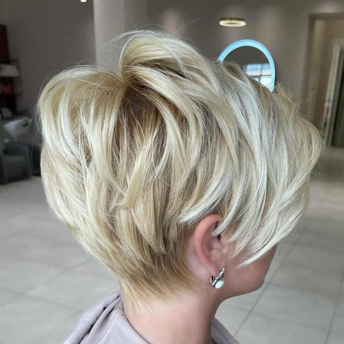 Blonde layered long pixie cut