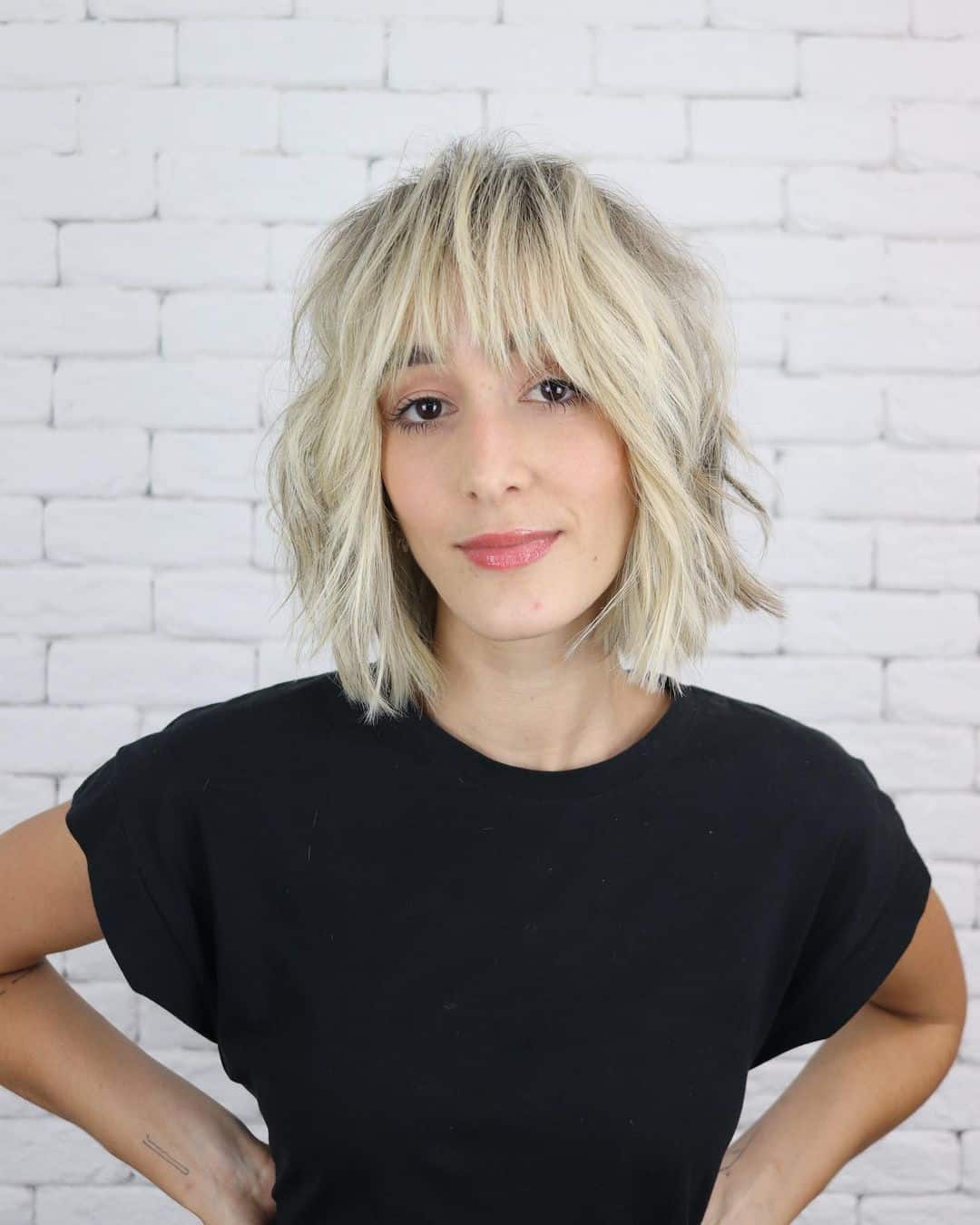 Blonde Shaggy Layered Bob with Bangs