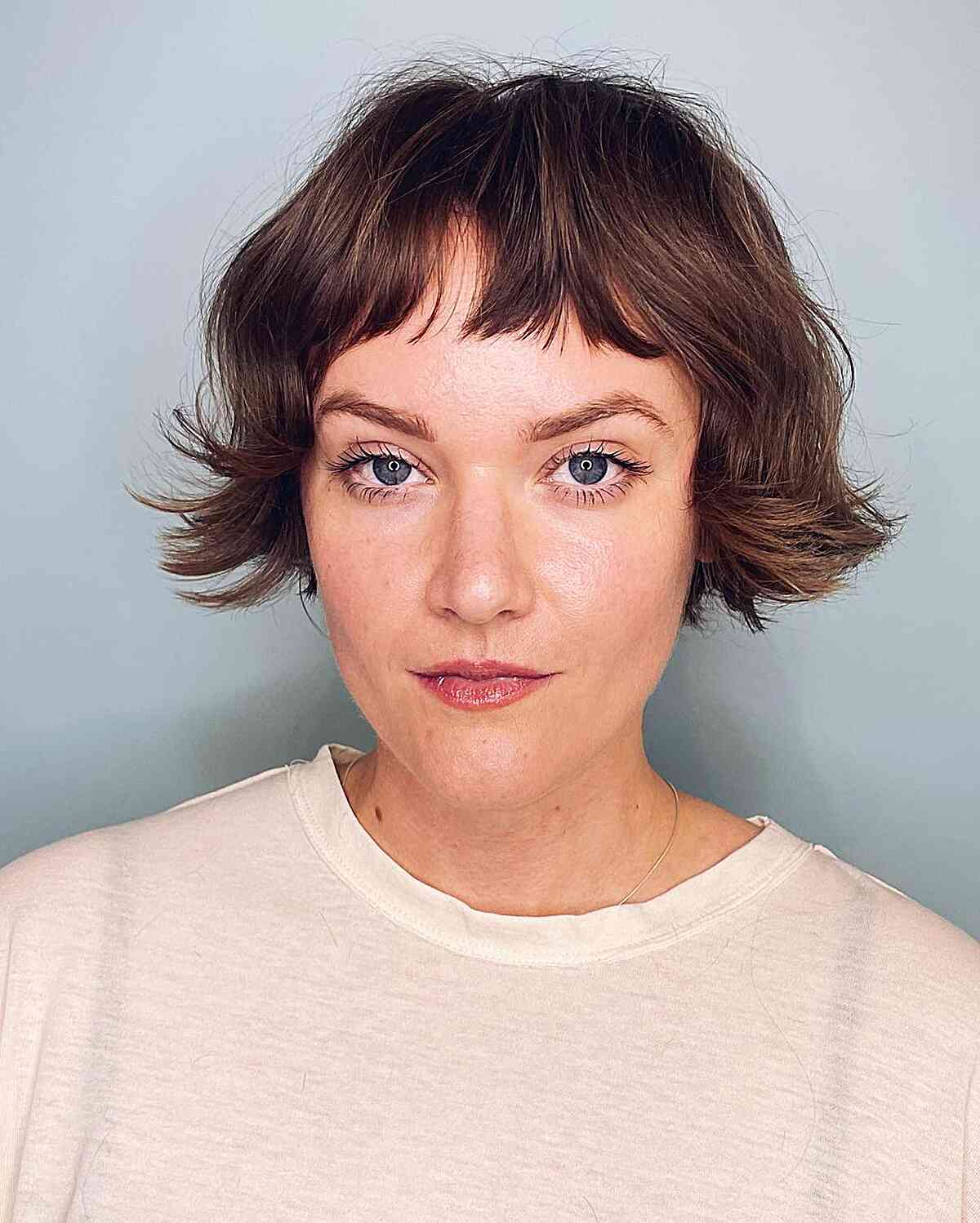 Cheek-Length French Bob Cut with Baby Bangs