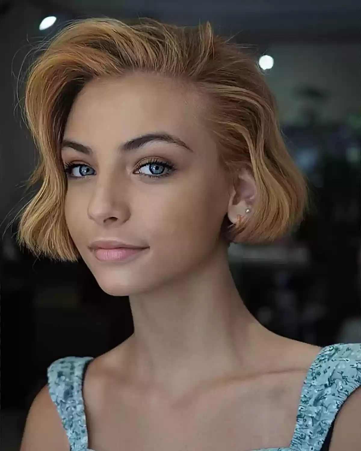 Ear-Length Side-Swept Very Short Wavy Bob