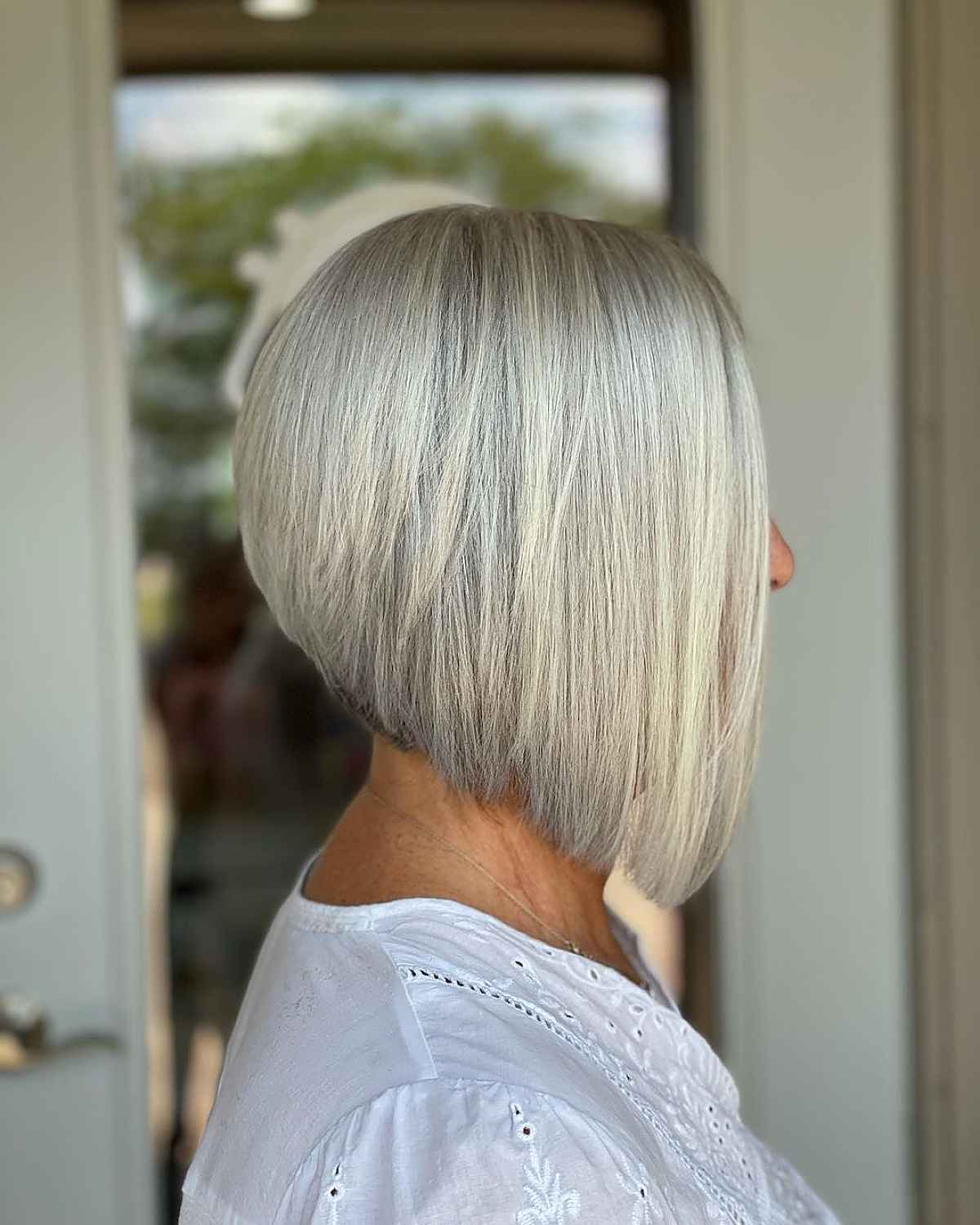 Feminine Angled Bob with Layers and Bangs