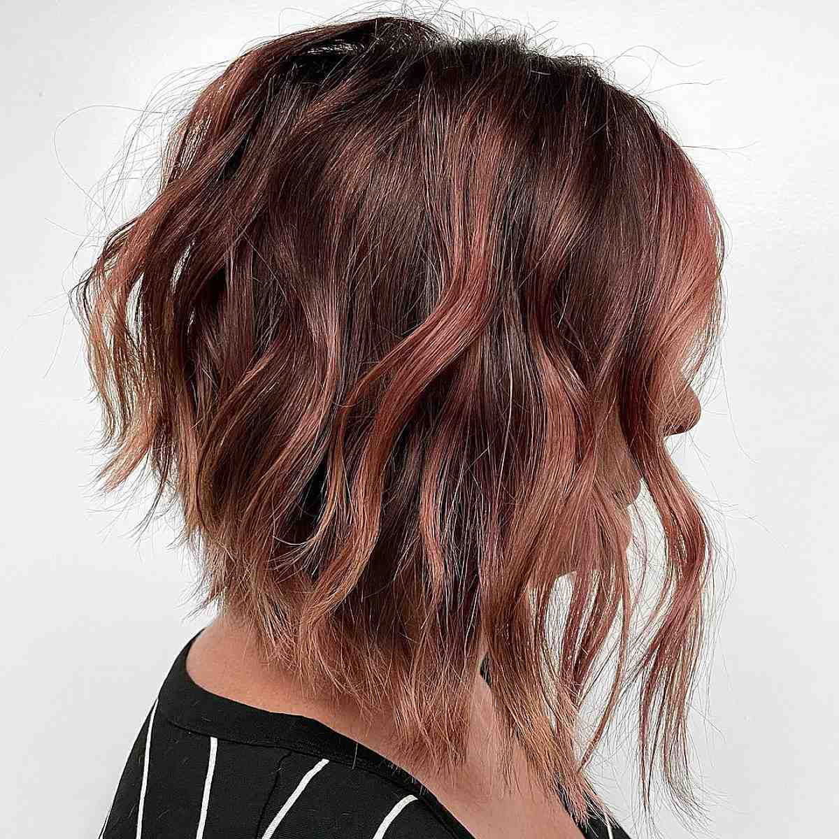 Feminine red toned a-line bob haircut