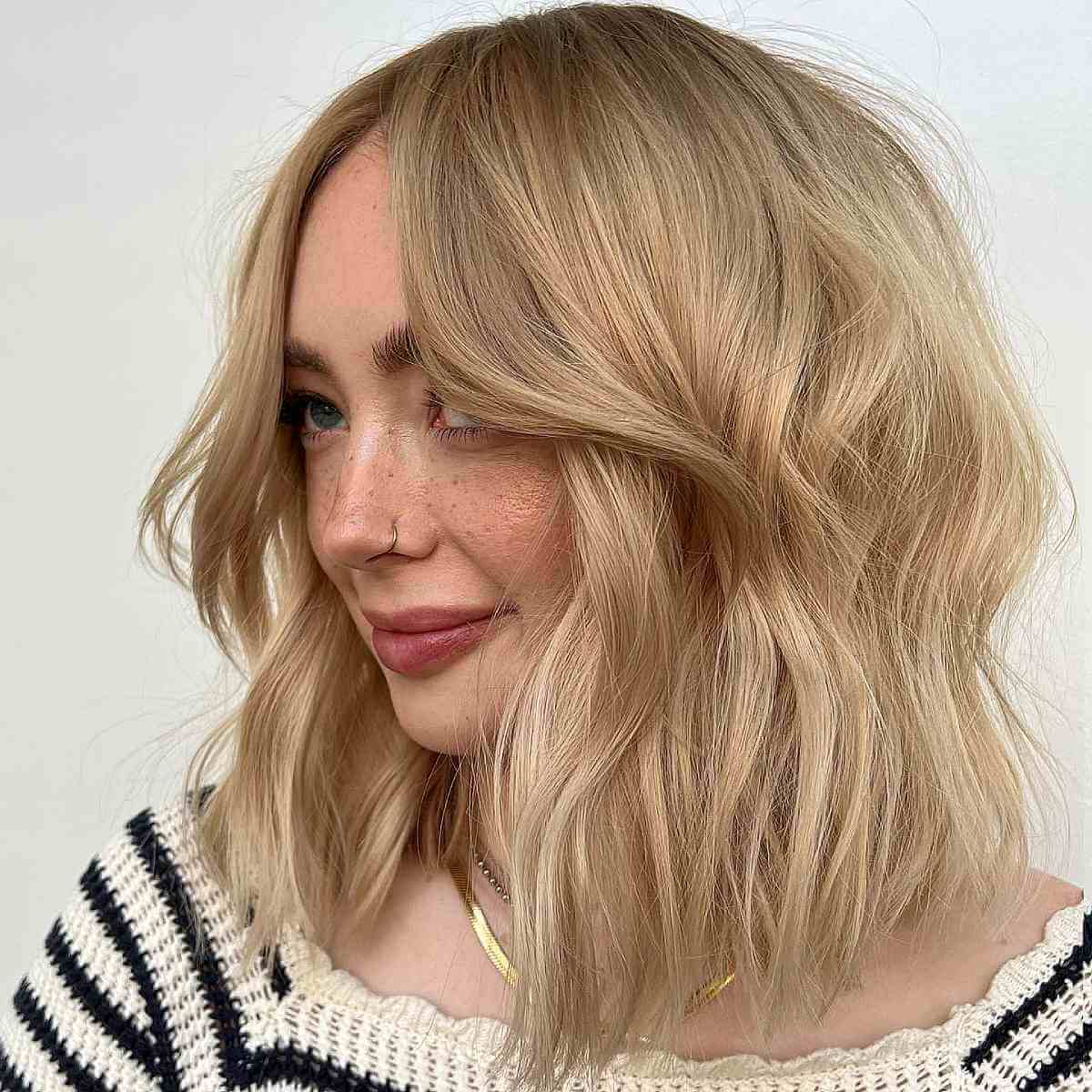 Golden Blonde Lived-In Textured Lob Cut