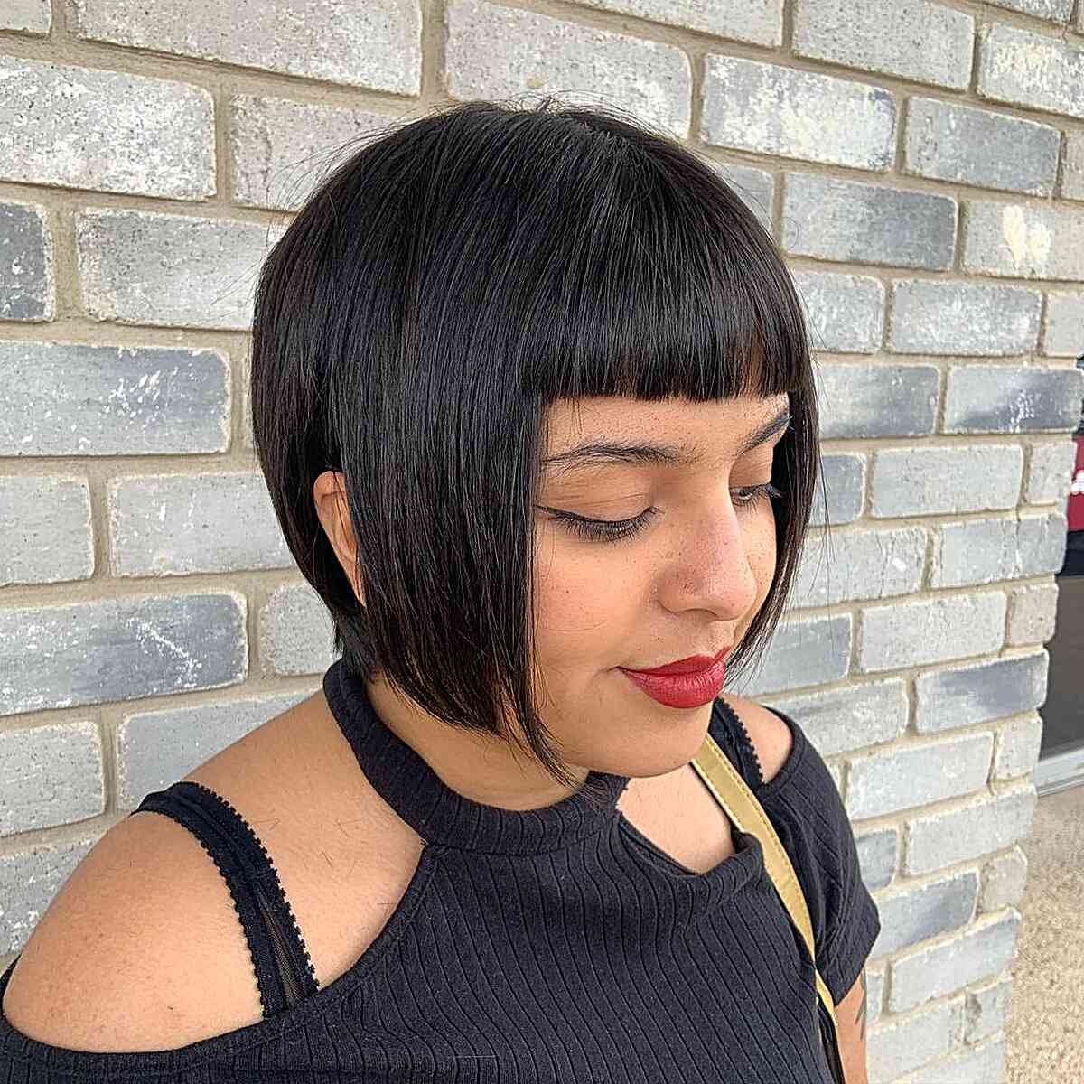 Jaw-Length Black Pixie Bob with Mini Fringe for Round-Shaped Faces