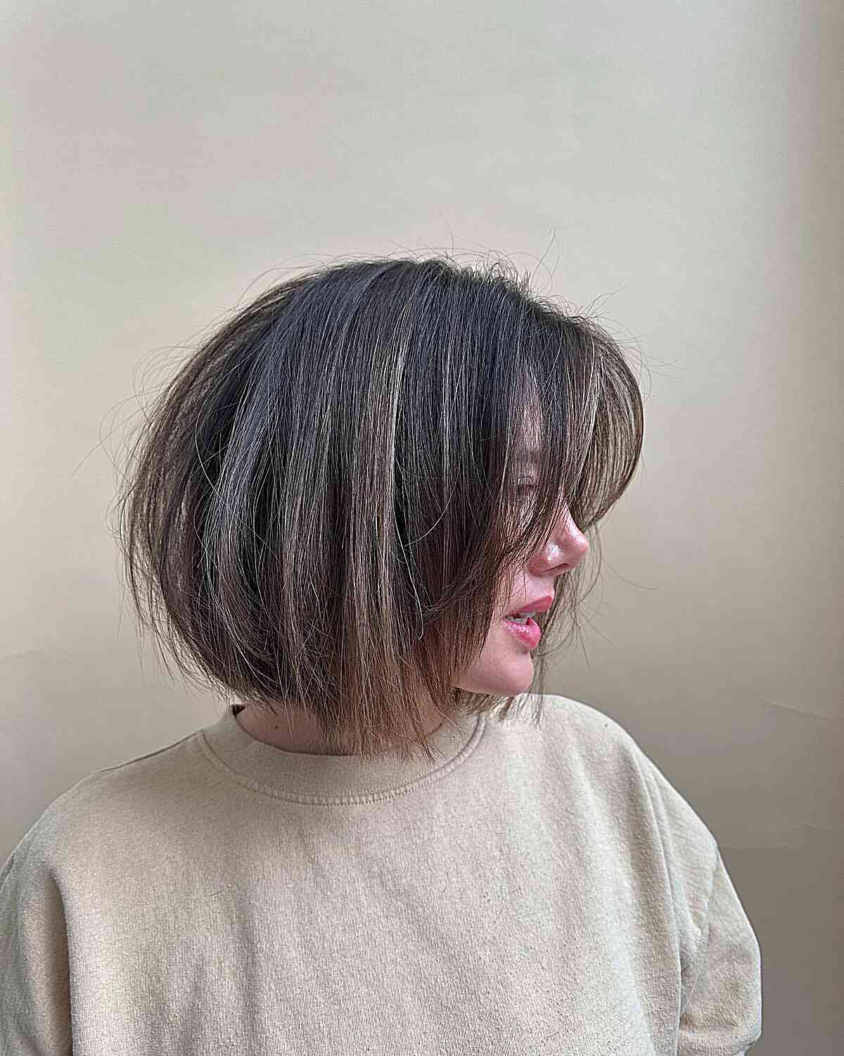 Layered bob with long bangs hairstyle