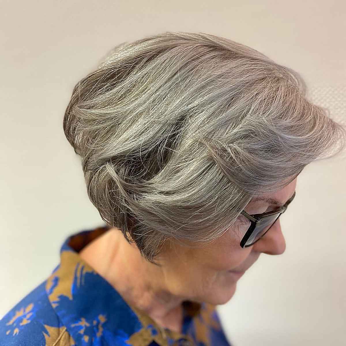 Layered Cut with Feathered Bangs for Gray Hair