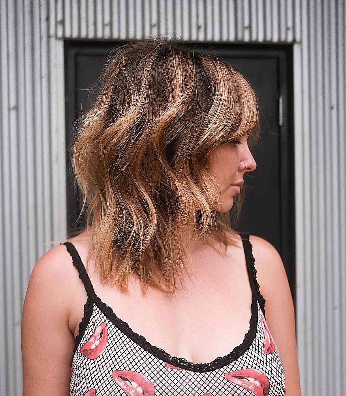 Long bob haircut with cascading layers