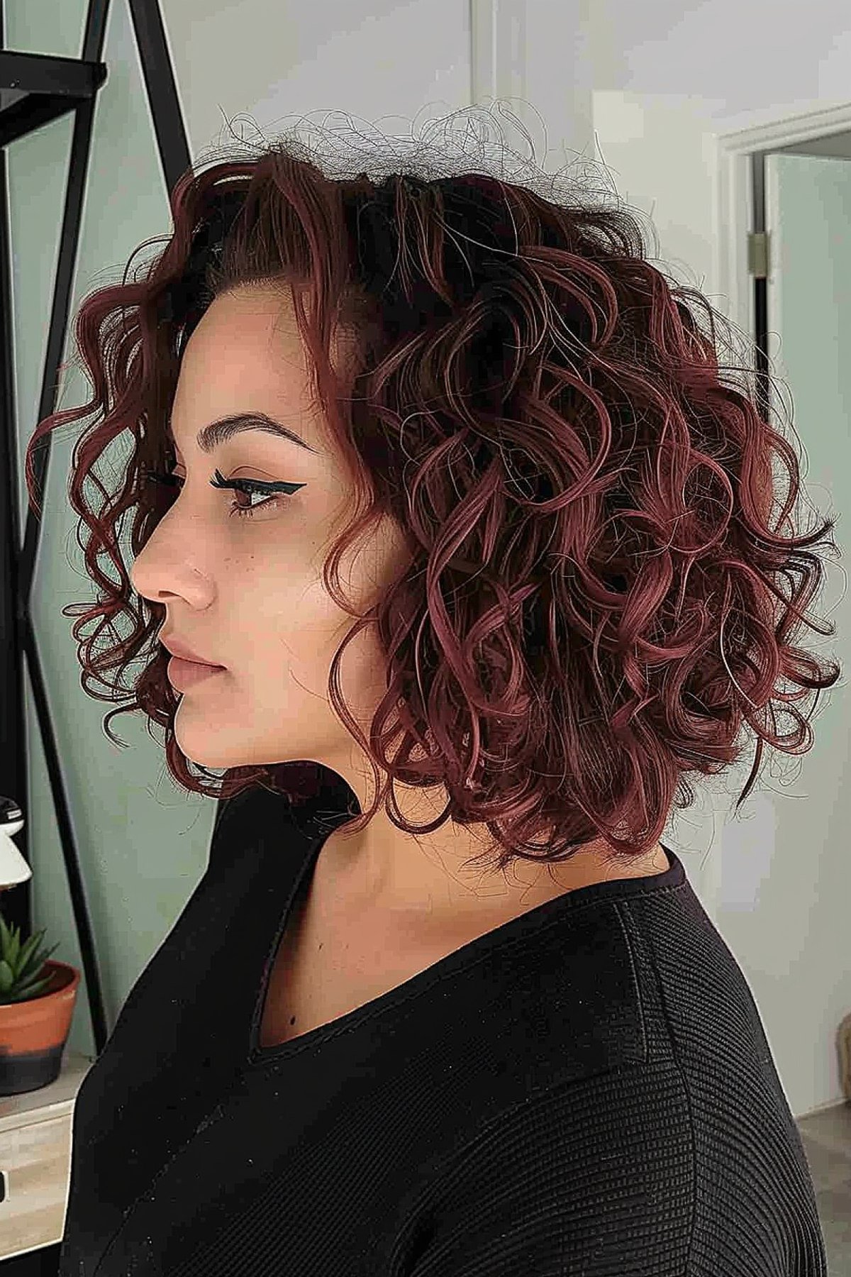 Medium Curly Bob with Burgundy Highlights Hairstyle