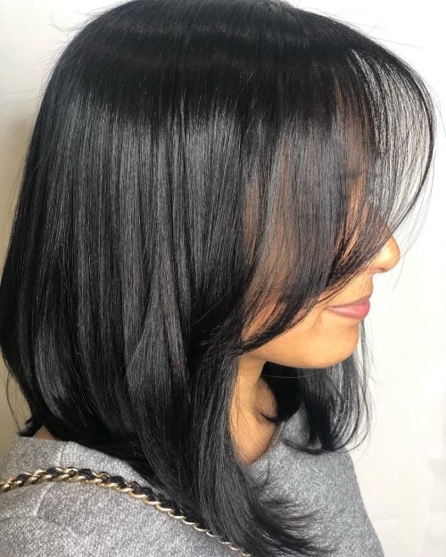 Medium length inverted bob with bangs