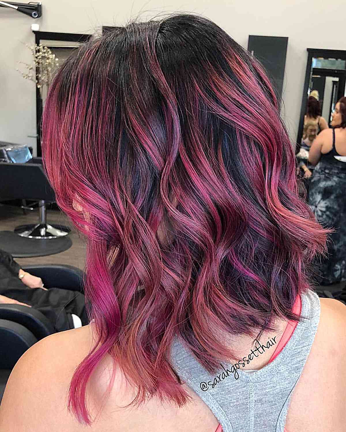 Messy Piece-y Wavy Bob with Magenta Highlights