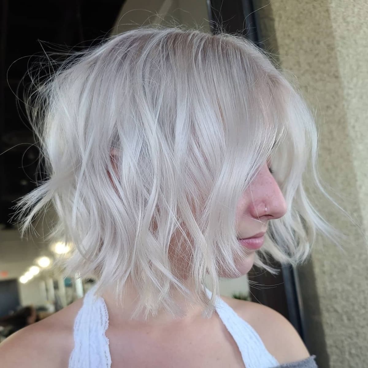 Platinum shaggy bob on a short haircut