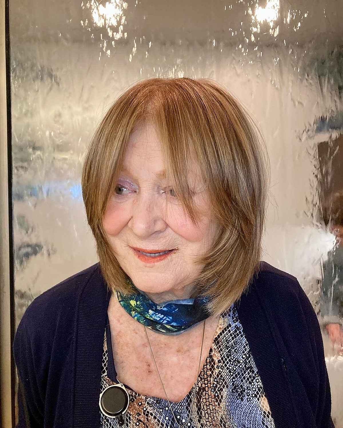 Romantic Shoulder-Length Layered Bob for Older Women