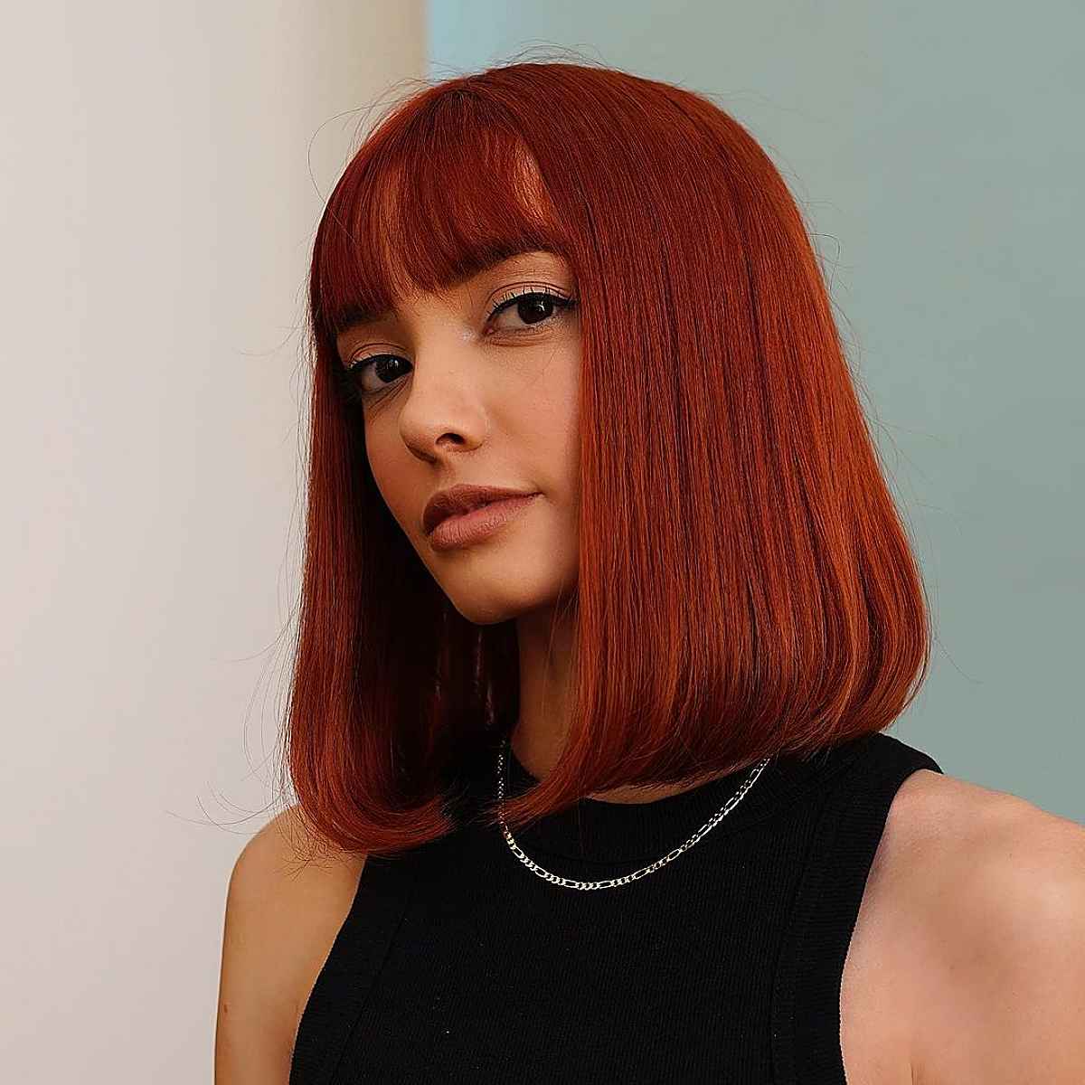 Sassy medium-length bob for thick hair and bangs