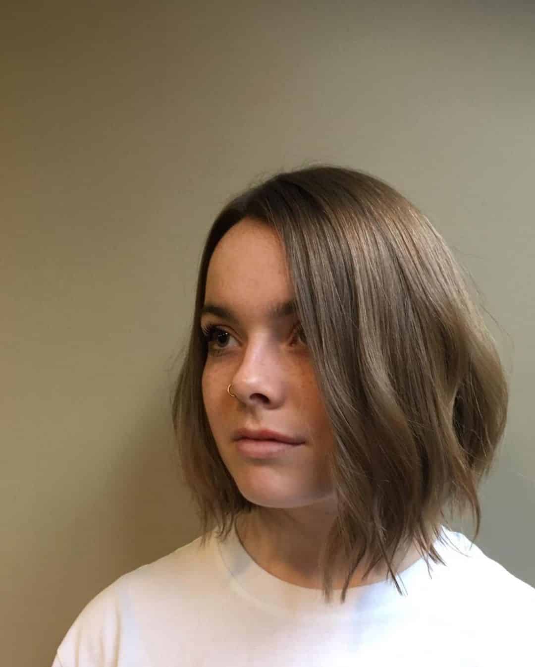 short asymmetrical stacked bob haircut