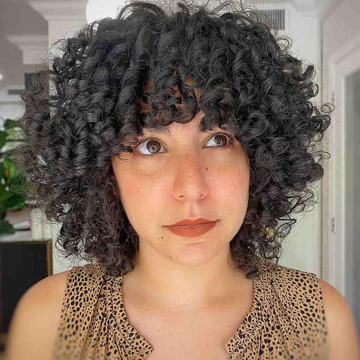 short curly bob with bangs