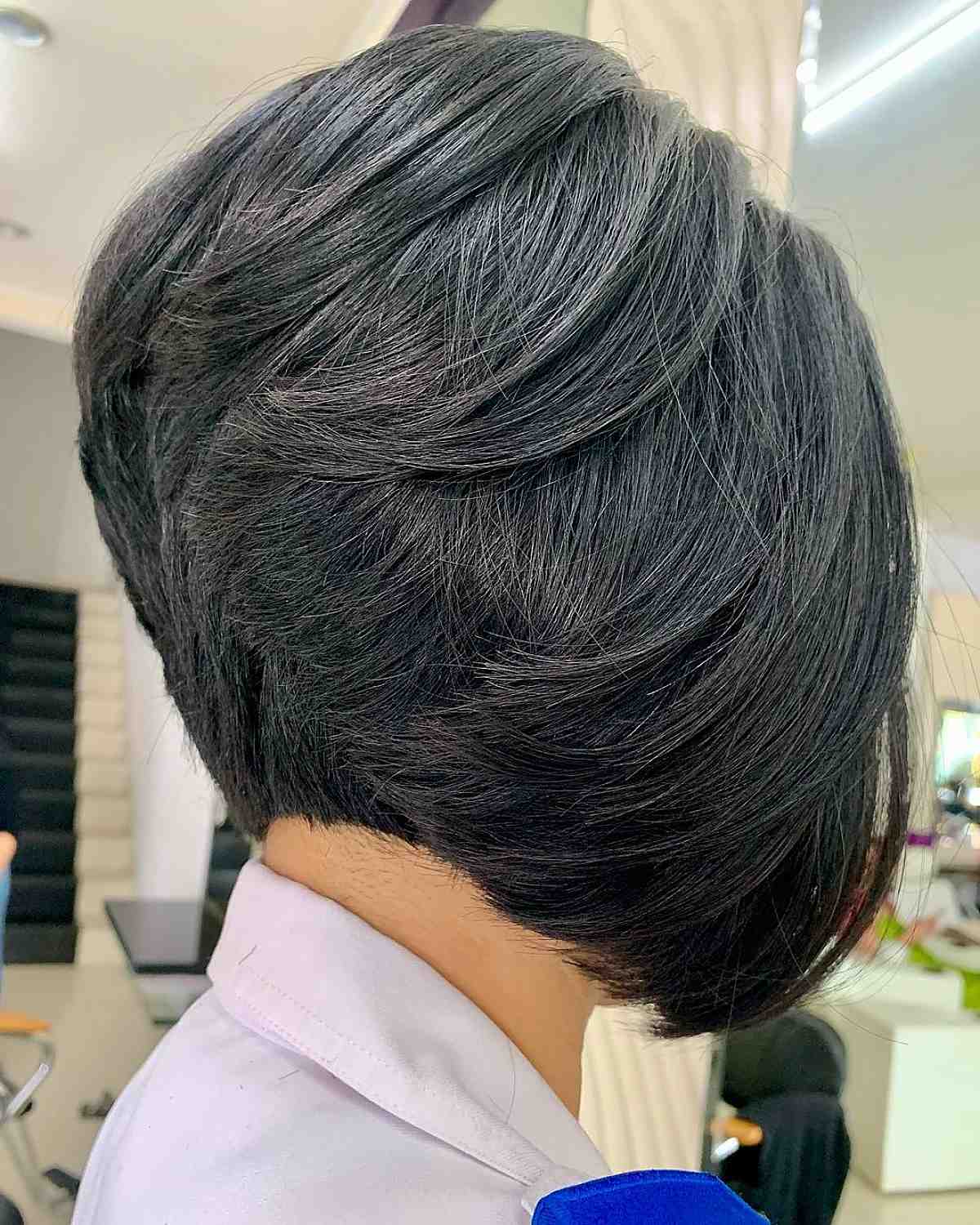 Short feathered layered bob haircut