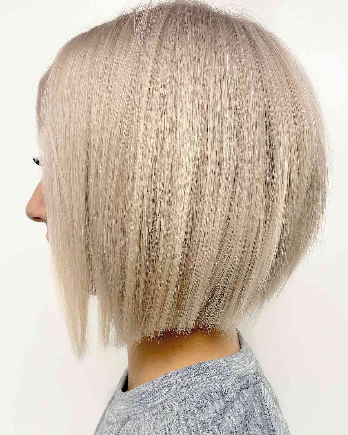 sleek blonde neck-length bob