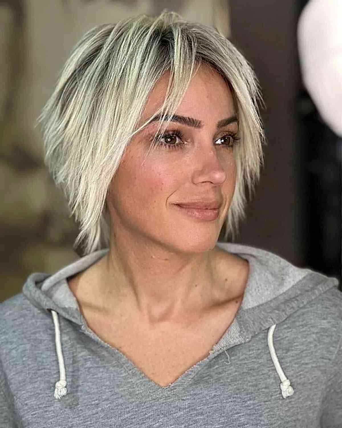 Stacked Blonde Choppy Pixie Bob