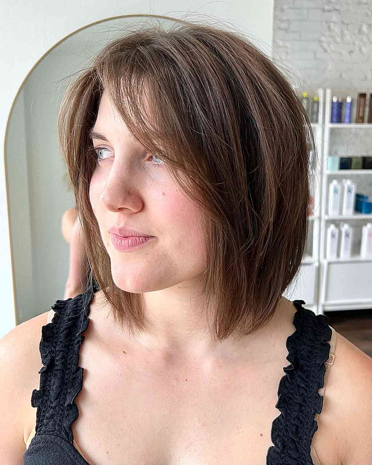 Straight Layered Neck-Length Italian Bob with Face-Framing Bangs