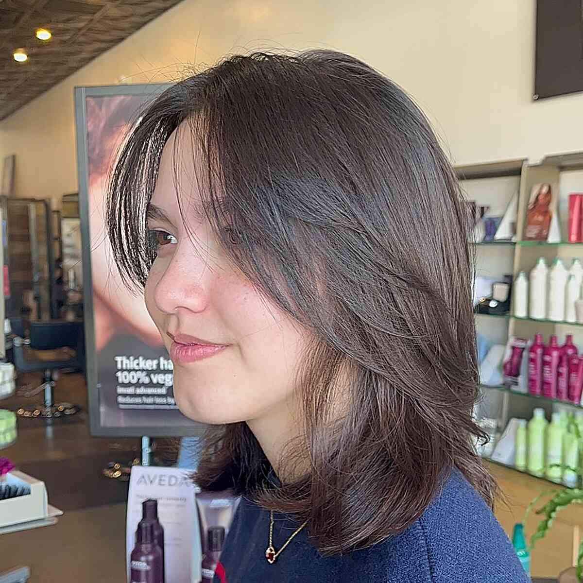 Straight Wispy Layers on Medium-Length Brown Bobbed Hair