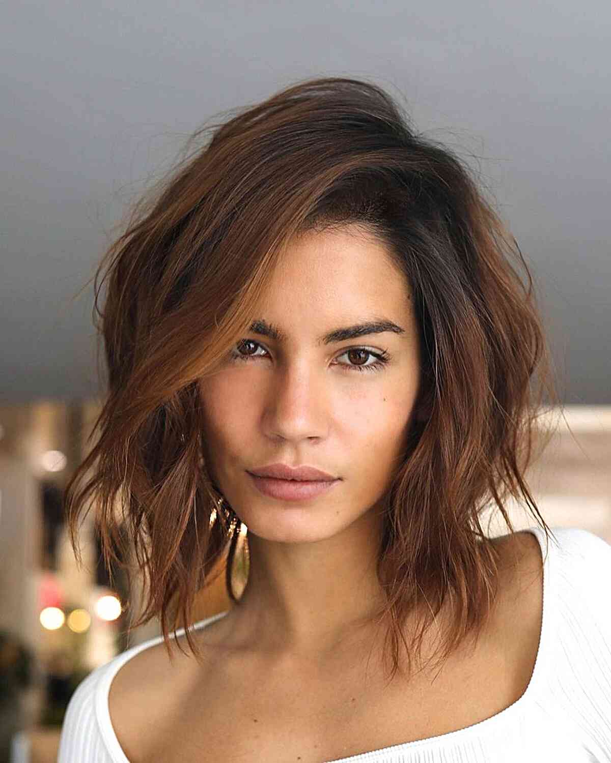 Textured and Side-Parted Bob for women with thin hair and choppy ends