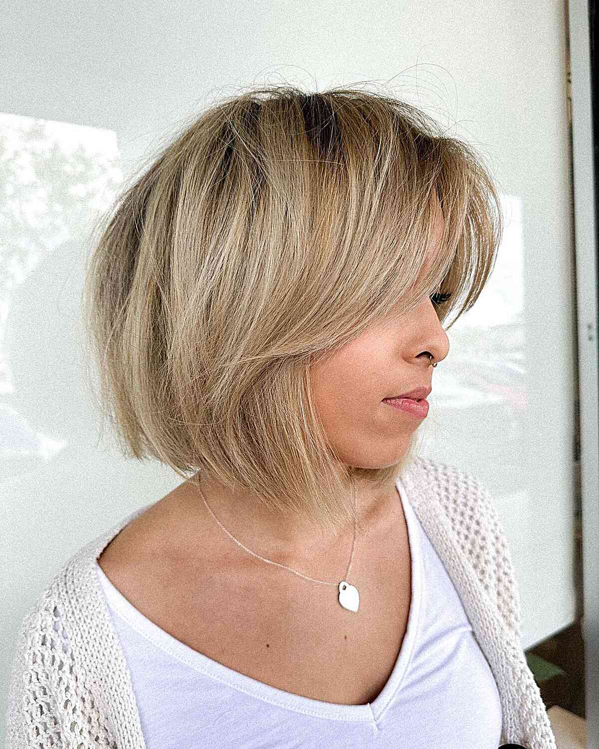 Textured Blunt Bob Cut with Bangs for women with short hair