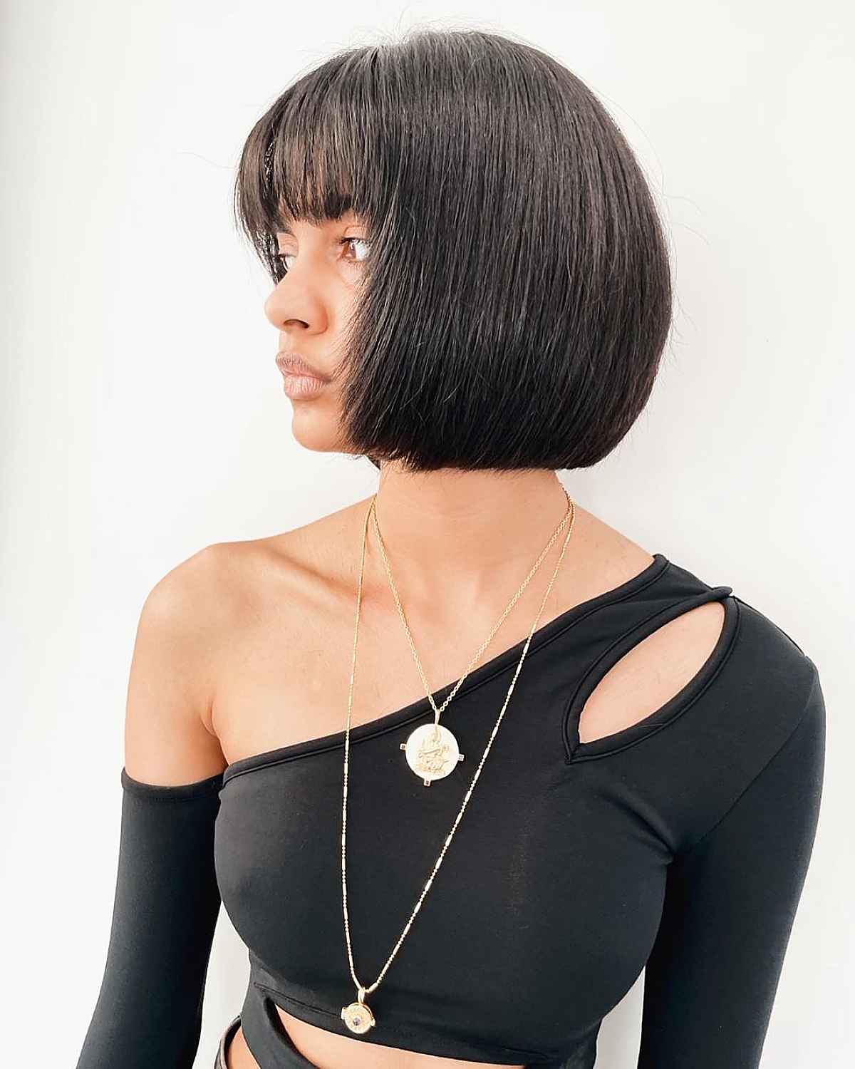 Trendy bob haircut with see-through bangs