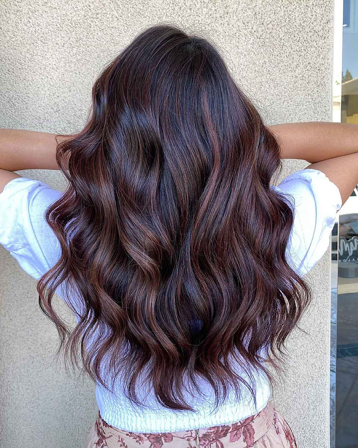 Black hair with mahogany red highlights