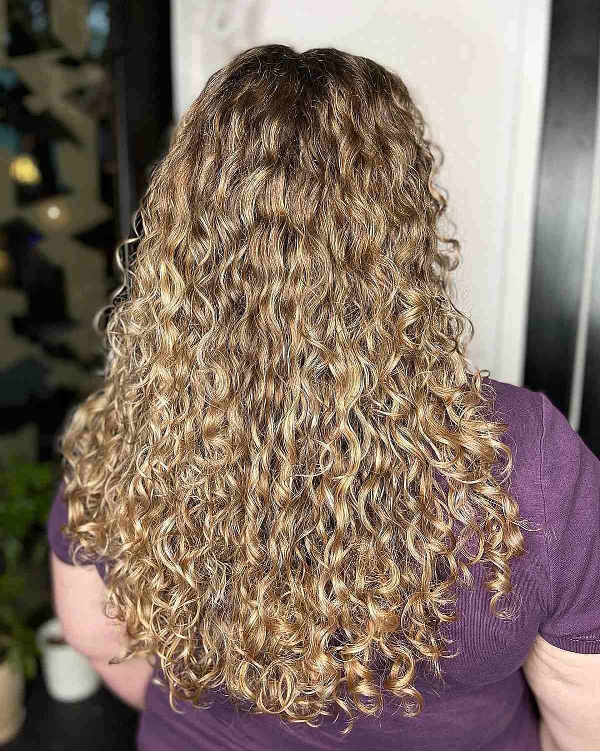 Hand-Painted Honey Blonde Balayage with Long Curls