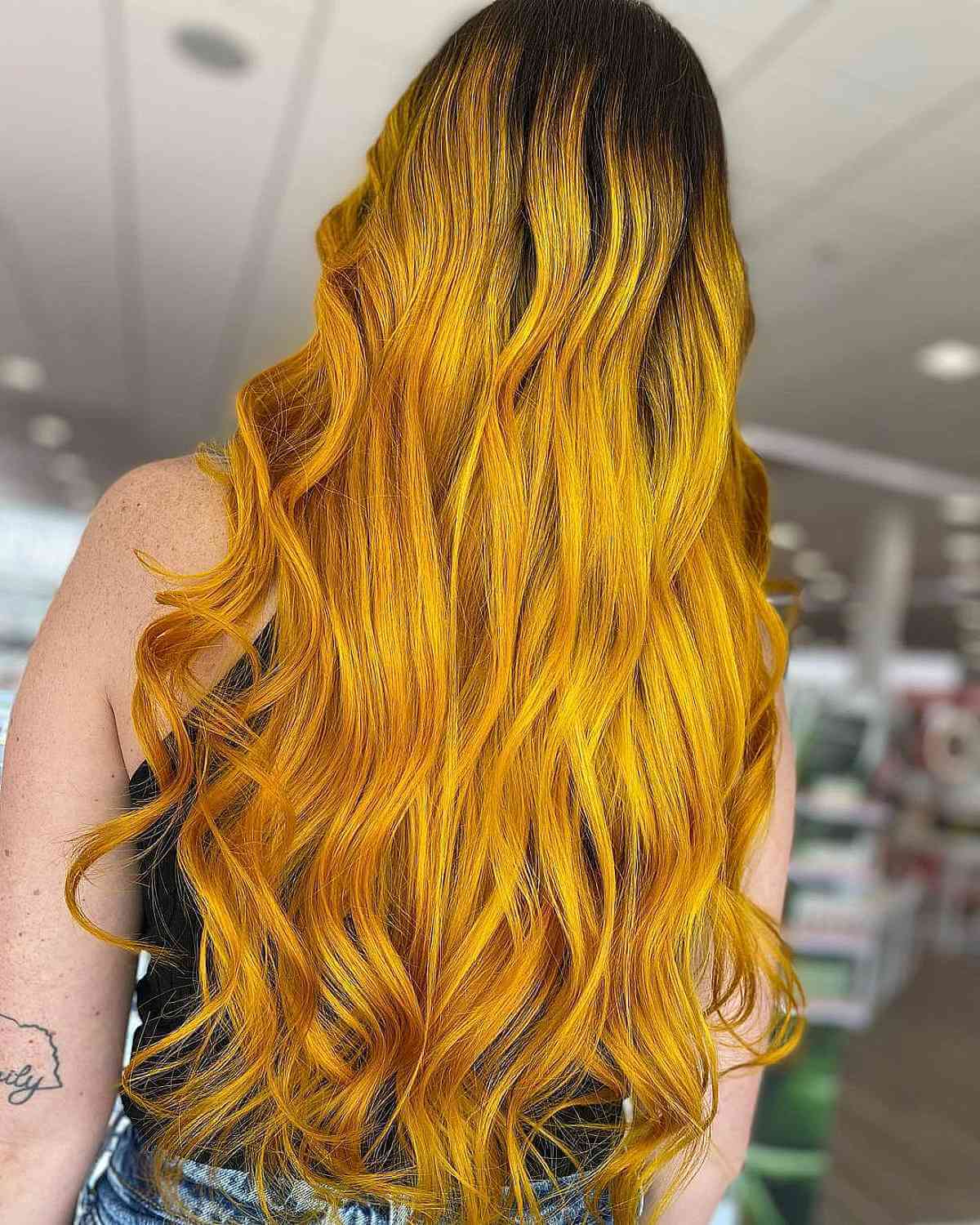 Long hair with dark roots and brassy yellow locks