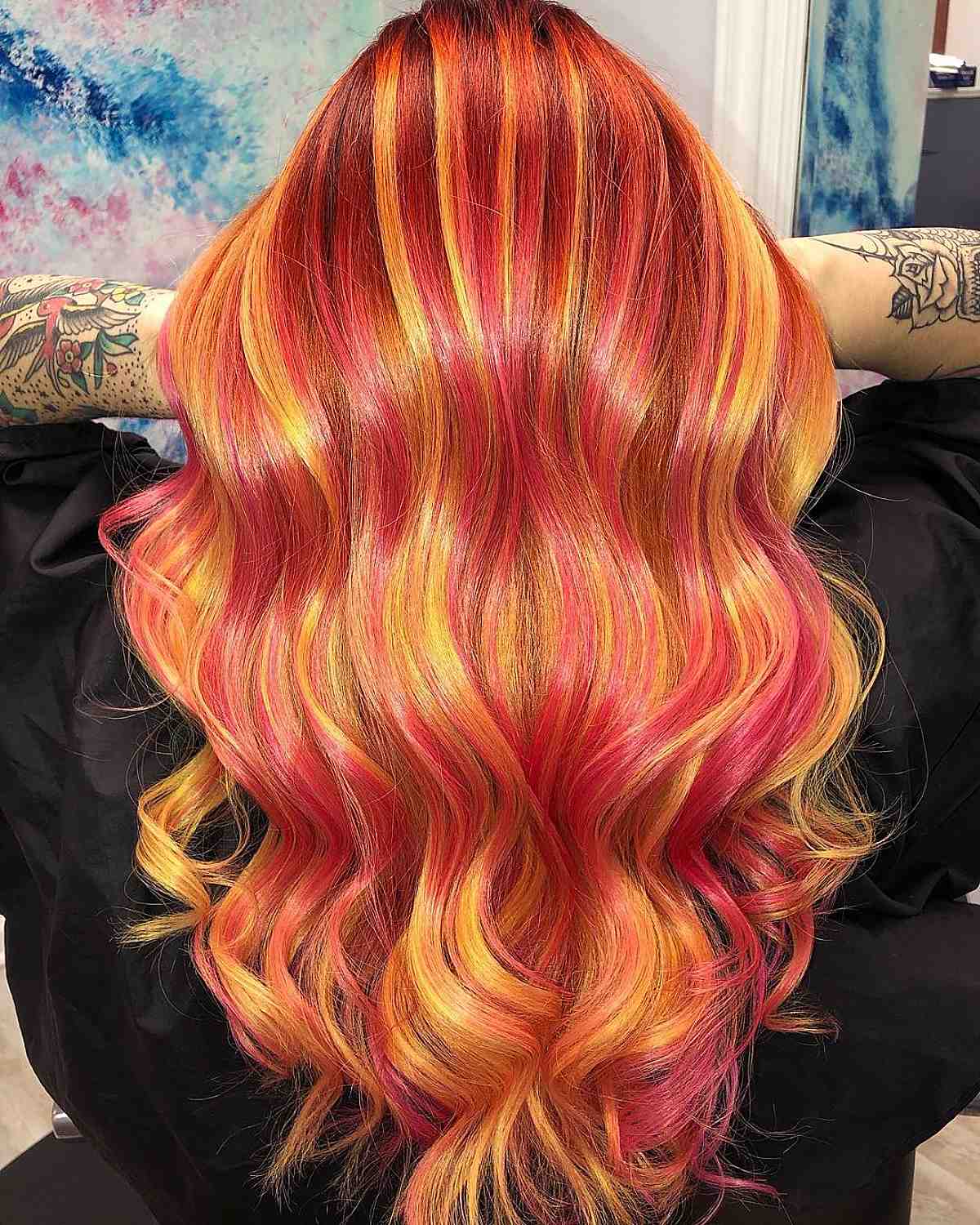 long hair with yellow and pink balayage