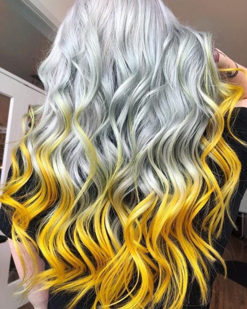 Long platinum blonde hair with yellow color at the ends