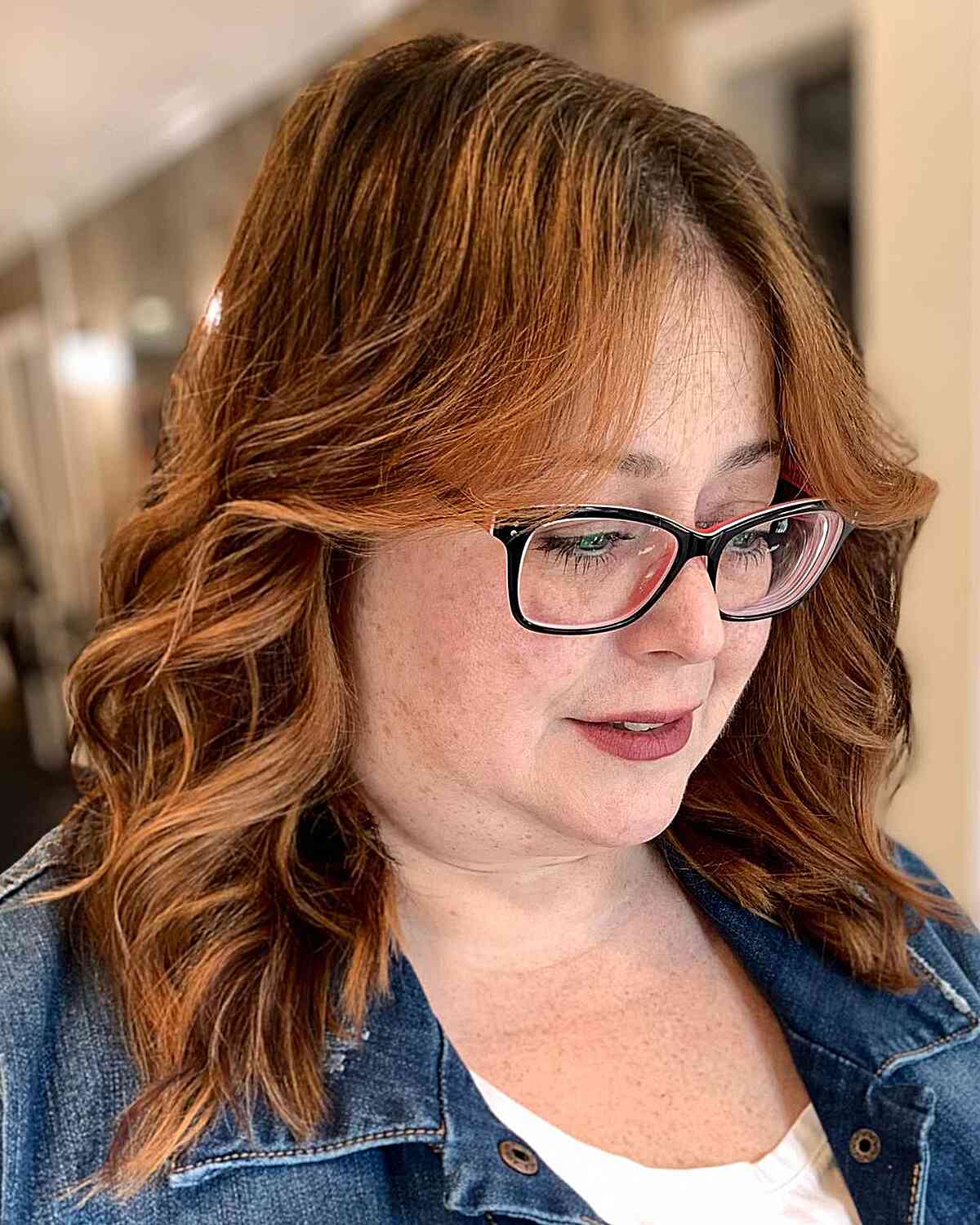 Medium Butterscotch Pumpkin Spice Balayage Hair with Curtain Bangs for Older Women