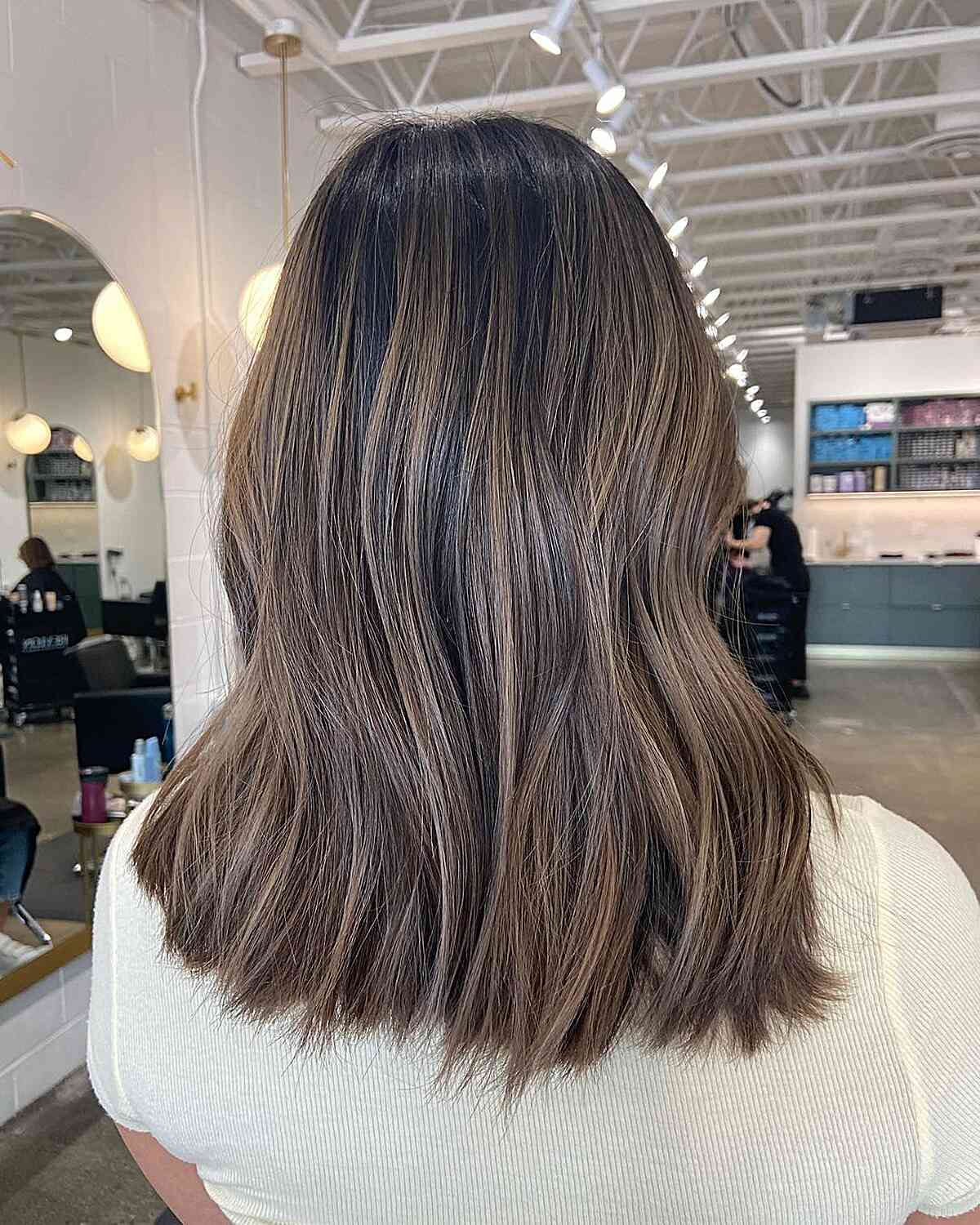 Mid-Length Dark Hair with Ash Brown Balayage Highlights