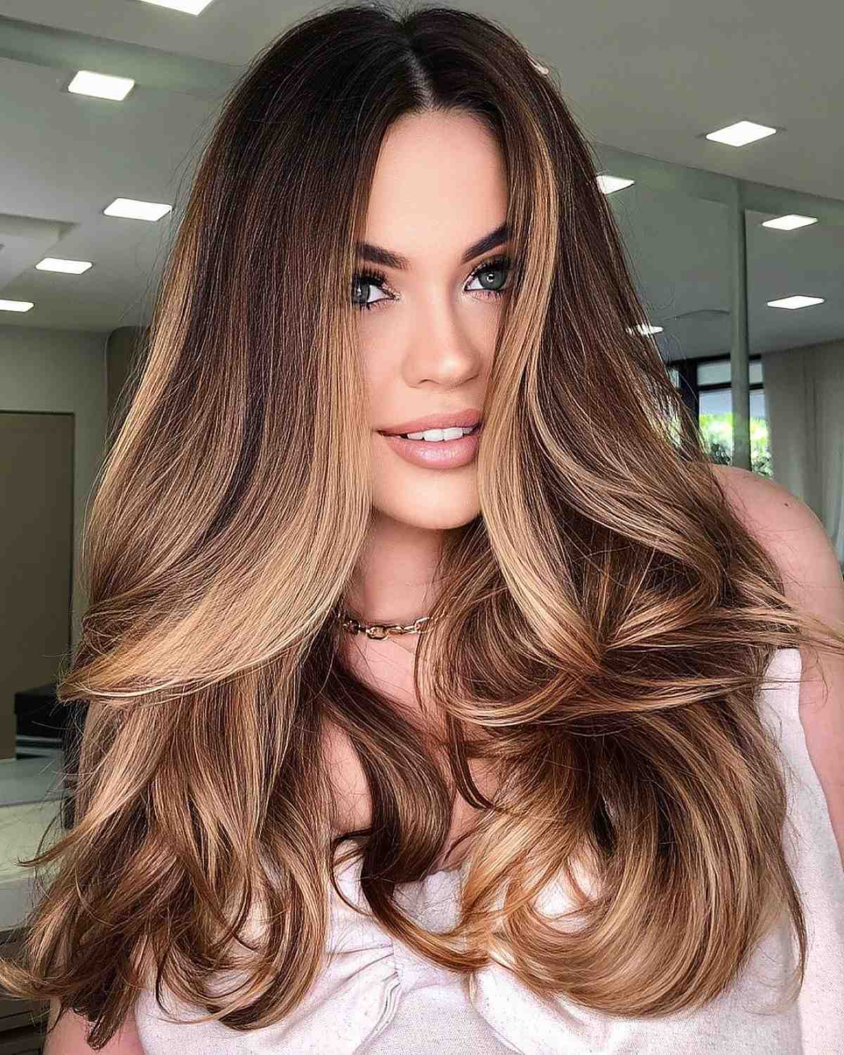 sun-kissed balayage highlights on brown hair