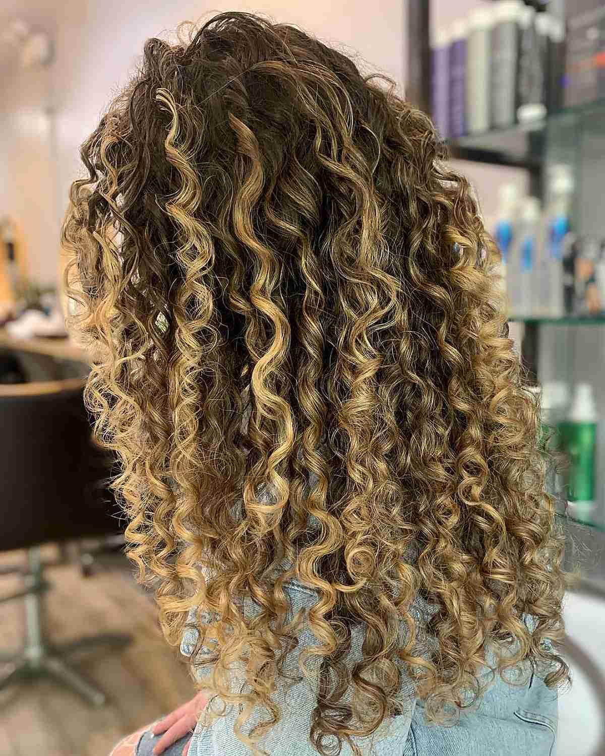 Warm Blonde Balayage Curls on Dark Brown Hair