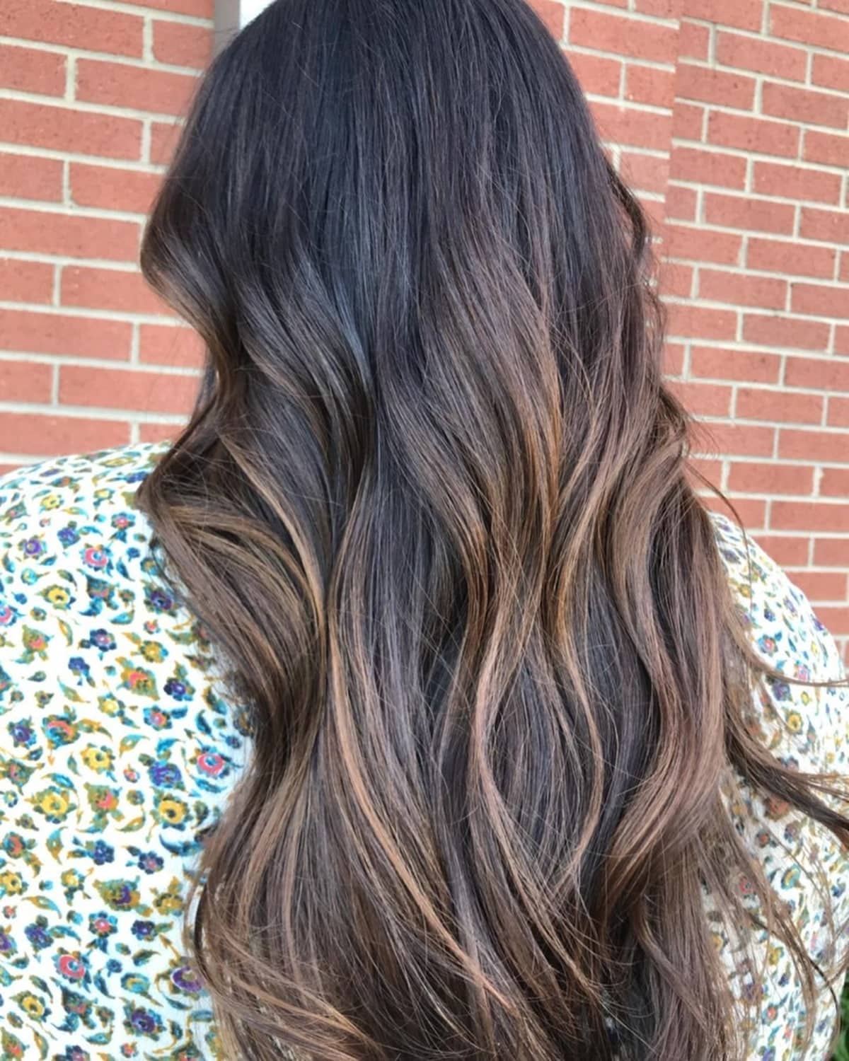 Beautiful mocha brown highlights on natural black hair