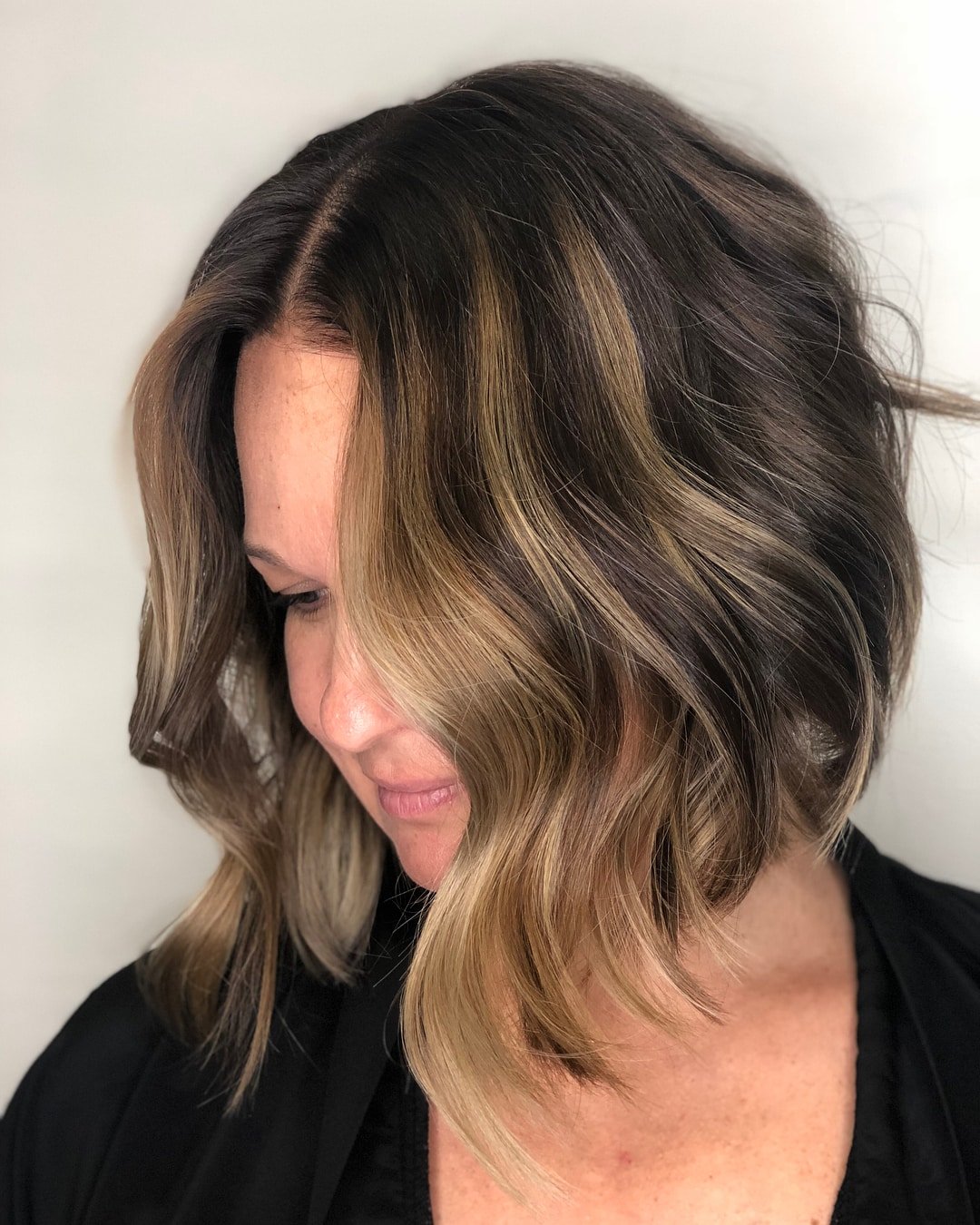 Black A-Line Bob with Dirty Blonde Highlights